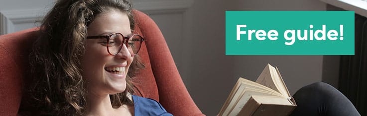 a girl in glasses with a book.